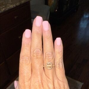 Elegant Gold Ring with Oval Gemstone